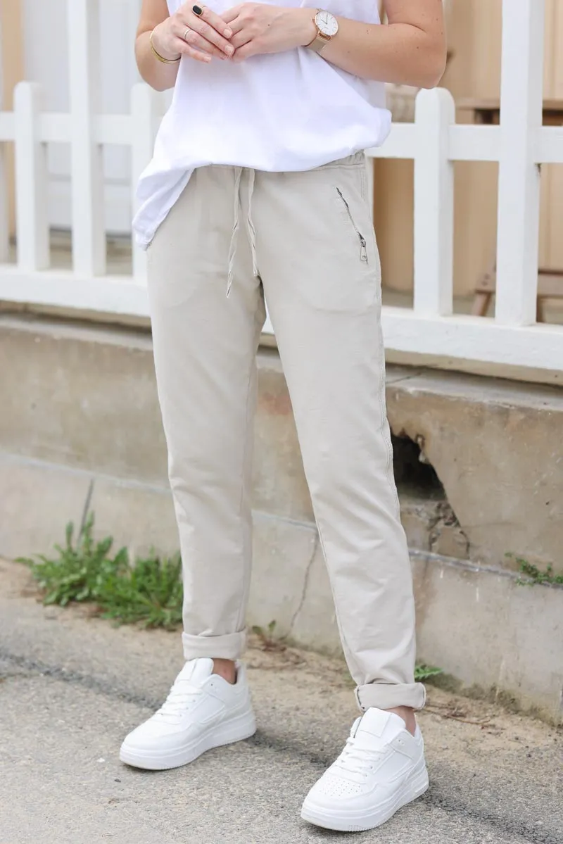 Jogging confort beige ceinture élastique liseré brillant sur les cotés