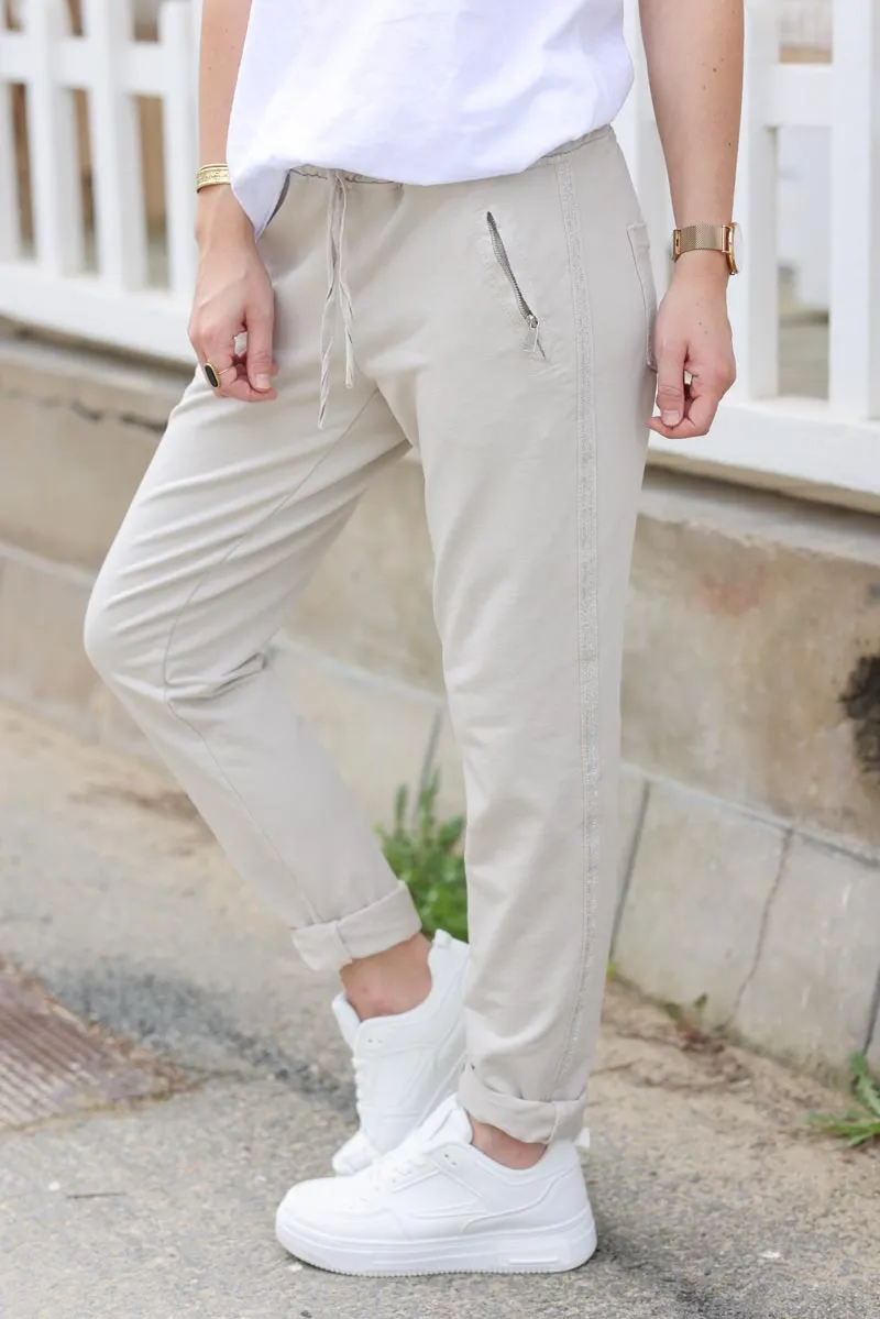 Jogging confort beige ceinture élastique liseré brillant sur les cotés